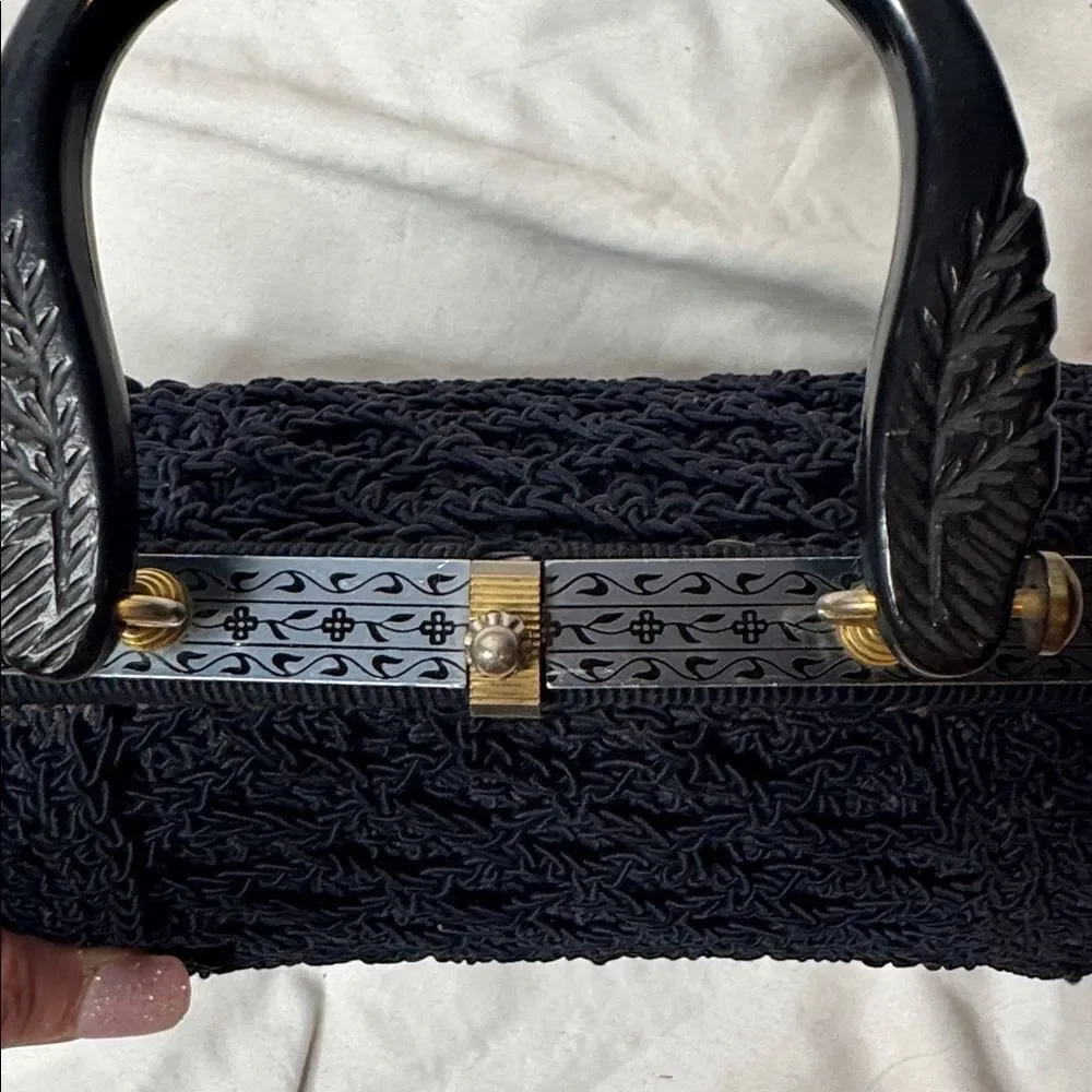 Vintage 60’s Black Knit Dumpling Bag With Silver And Gold Fixtures.